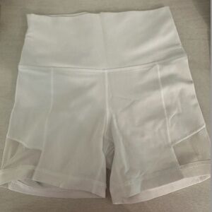 Aritzia high rise white biker short with mesh detail